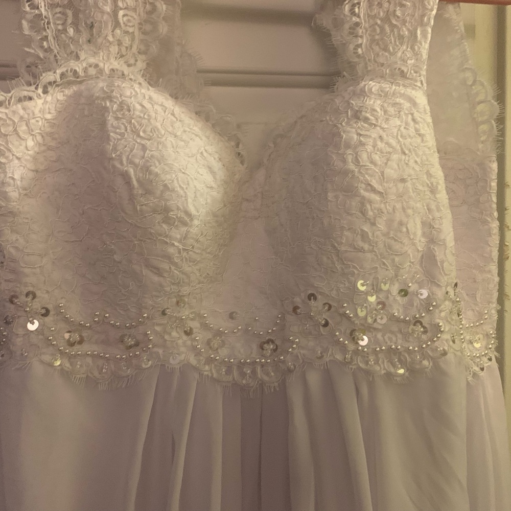 Beautiful brand new lace wedding dress